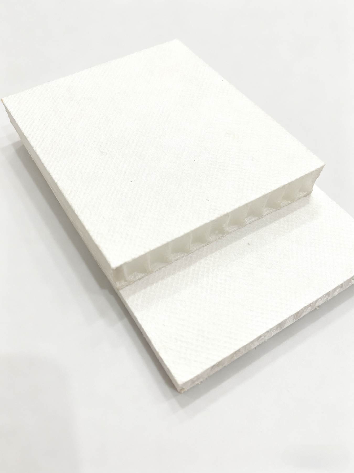 Thermoplastic honeycomb with non-woven